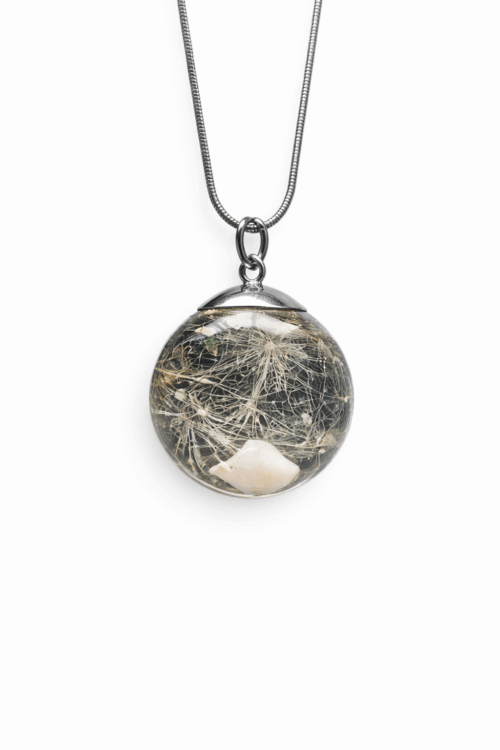 Kugel mit dem ausgefallenen Milchzahn deines Kindes als Geschenk der Zahnfee oder einfach als Andenken